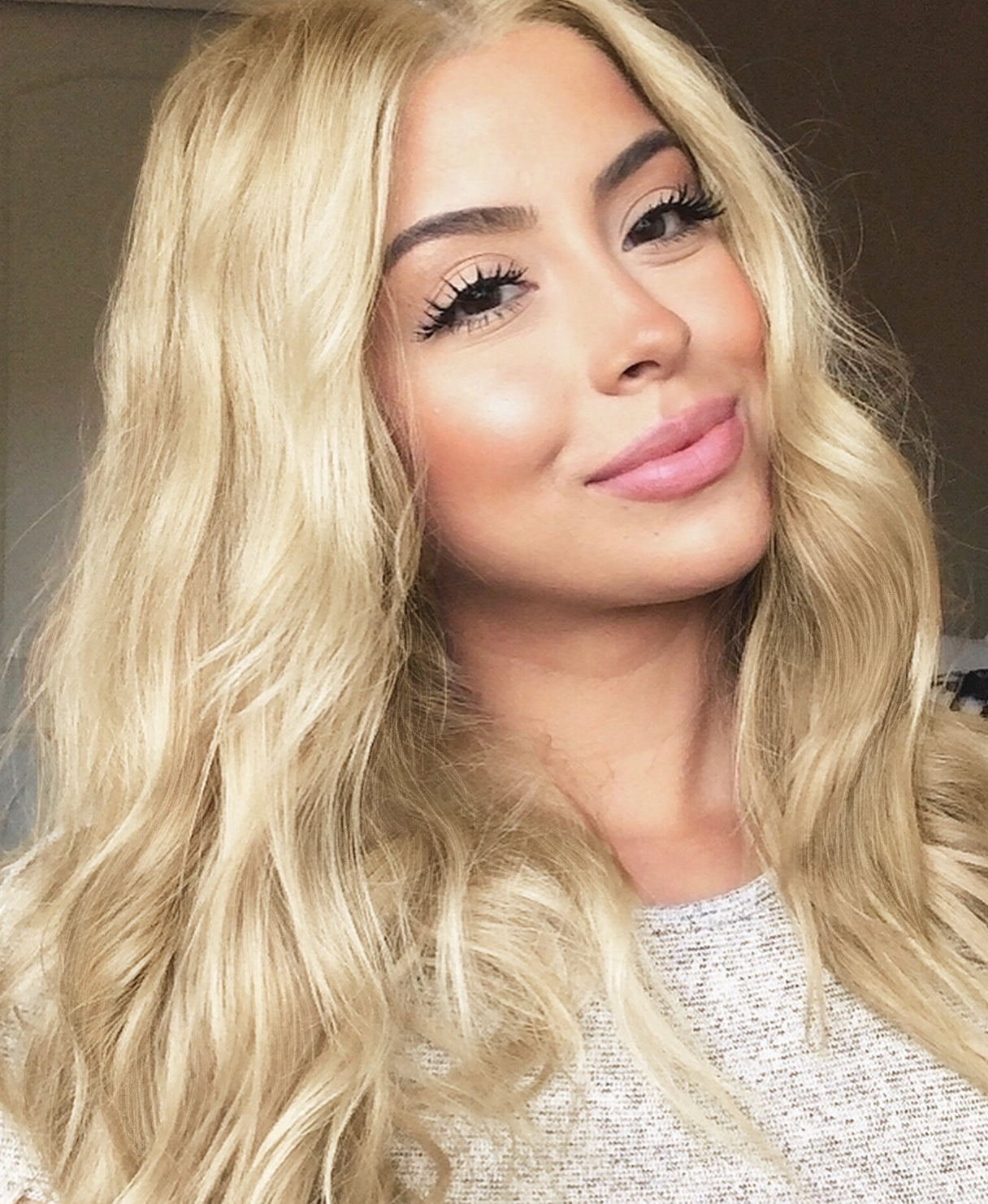 invisible clip-in hair extensions light blonde.