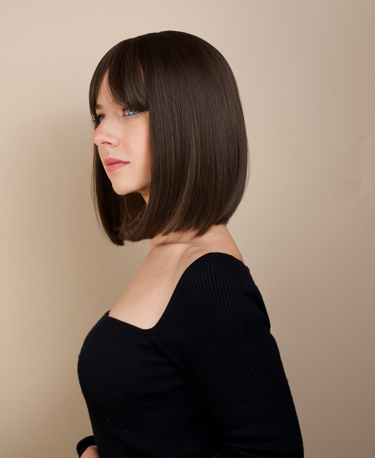vegan fiber wig - 10" brown bob with fringe and peekaboo highlights.