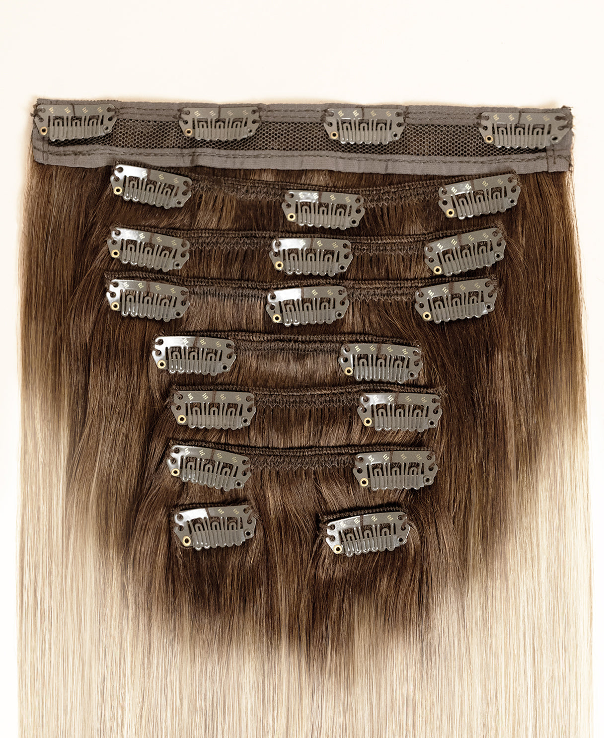 clip-in hair extensions shadow root white blonde.