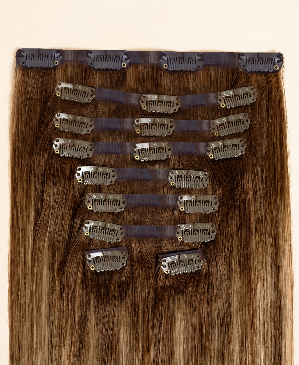 invisible clip-in hair extensions rooted beige highlights.