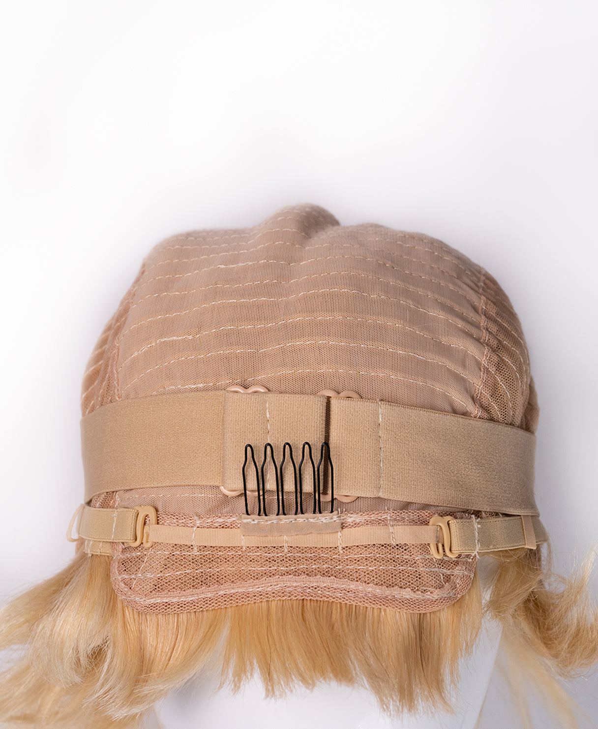 asymmetric wedge human wig - 6" light blonde.