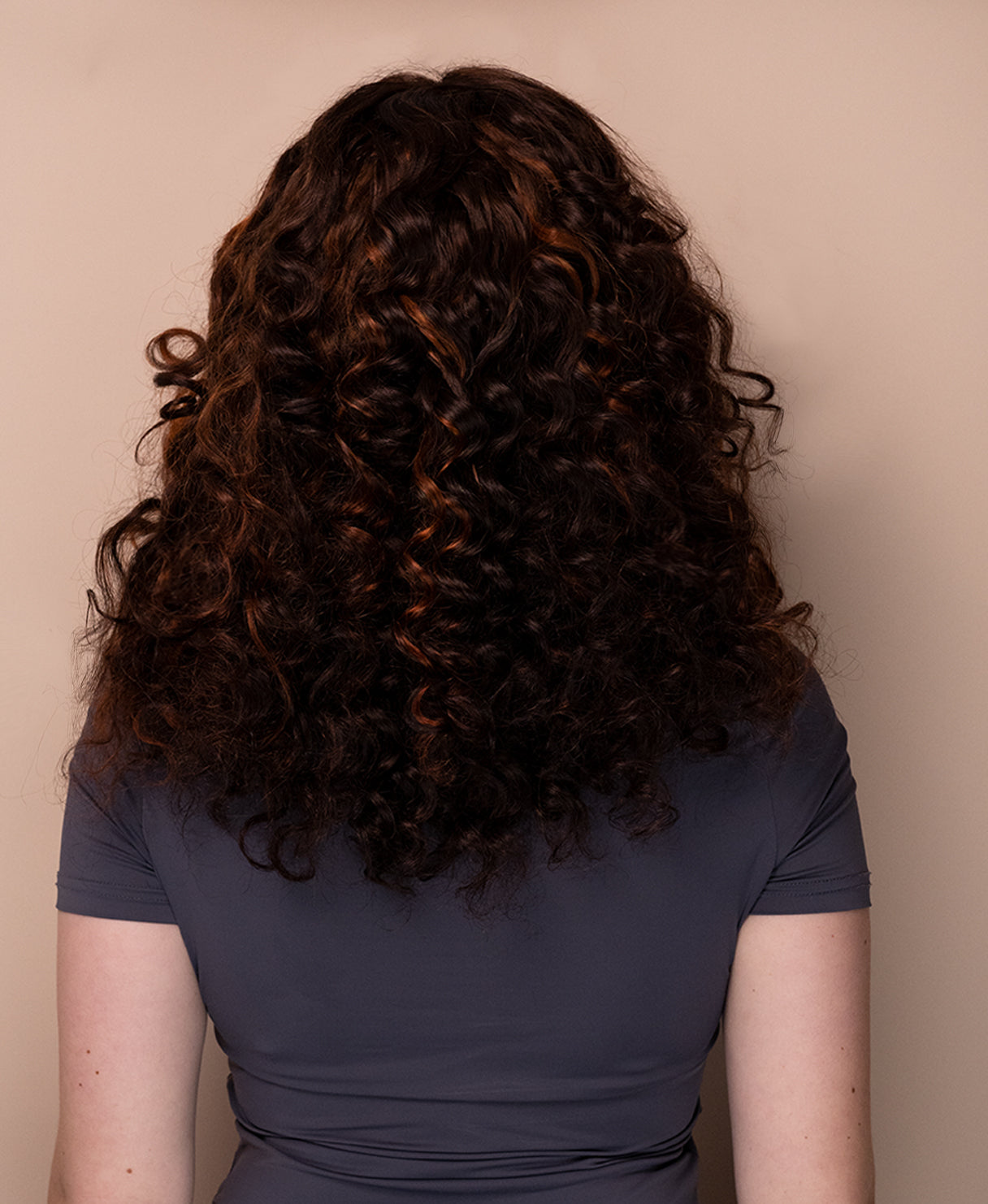lace front human wig - 16" curly brown with highlights.