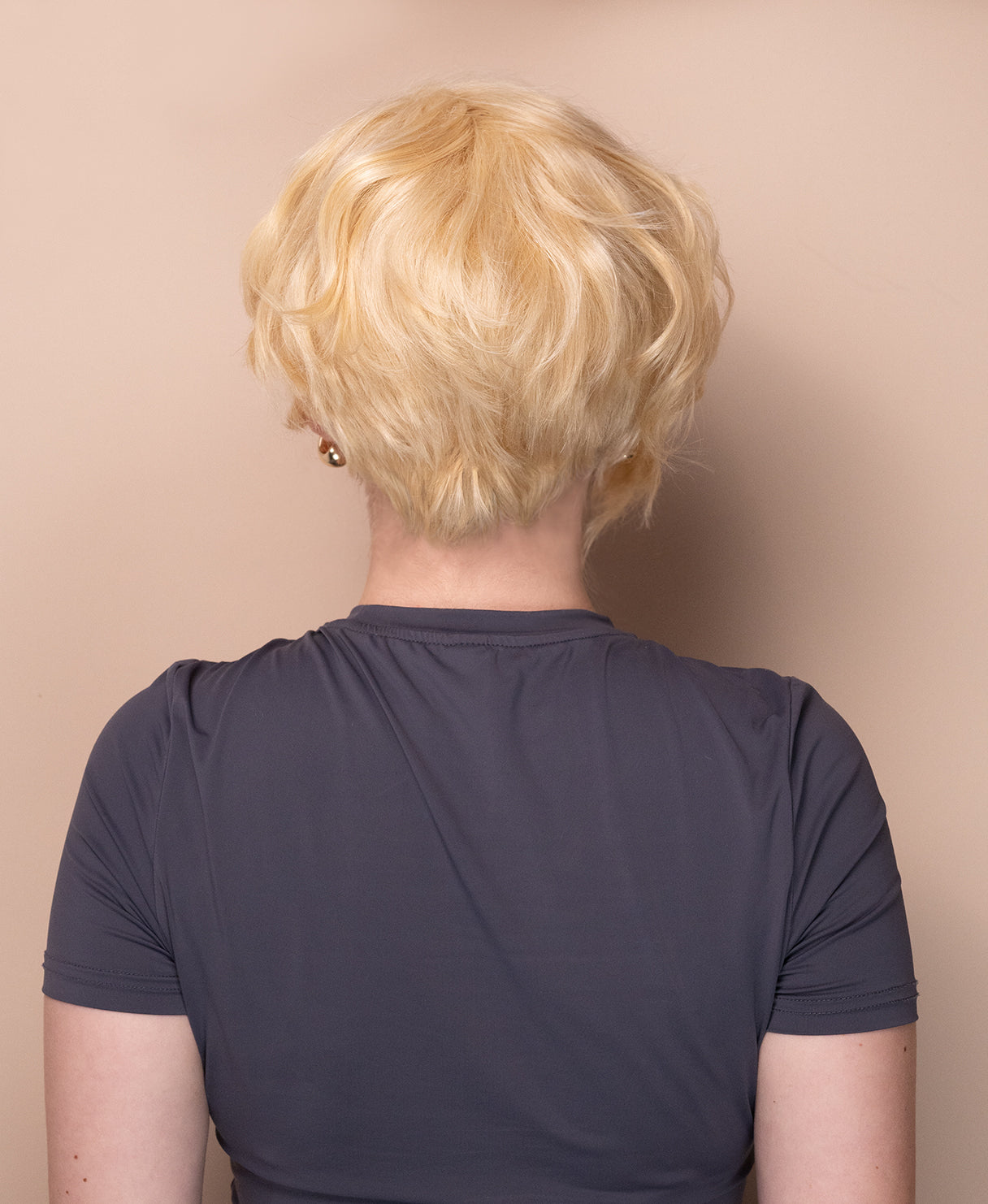 asymmetric wedge human wig - 6" light blonde.