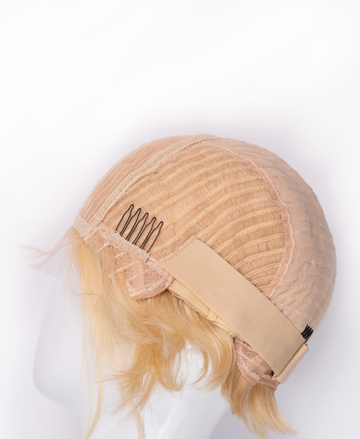 asymmetric wedge human wig - 6" light blonde.