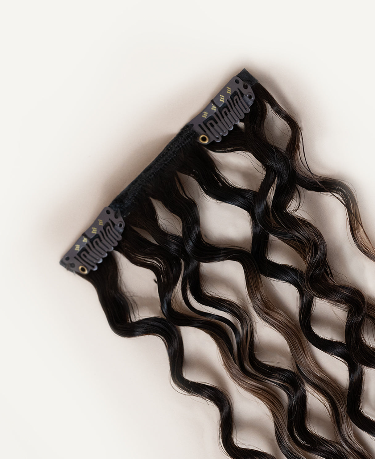 curly (3A curls) clip-in hair extensions ash brown balayage.