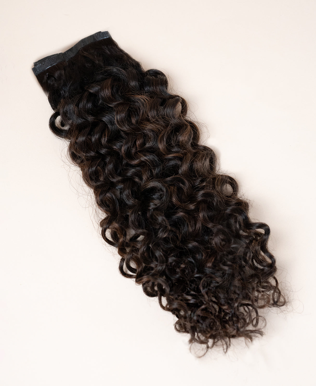 curly (3A curls) invisible clip-in hair extensions mocha balayage.