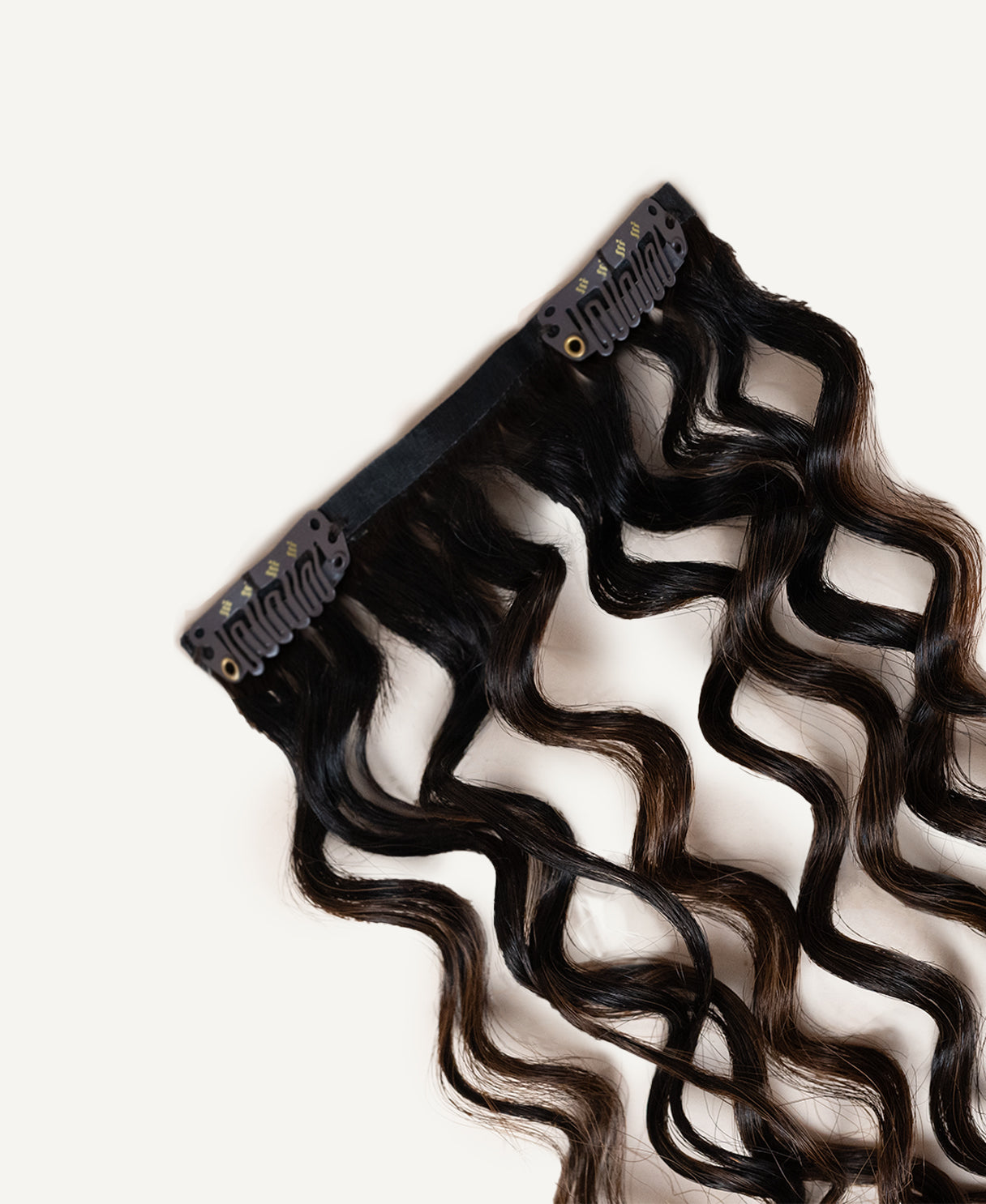 curly (3A curls) invisible clip-in hair extensions mocha balayage.