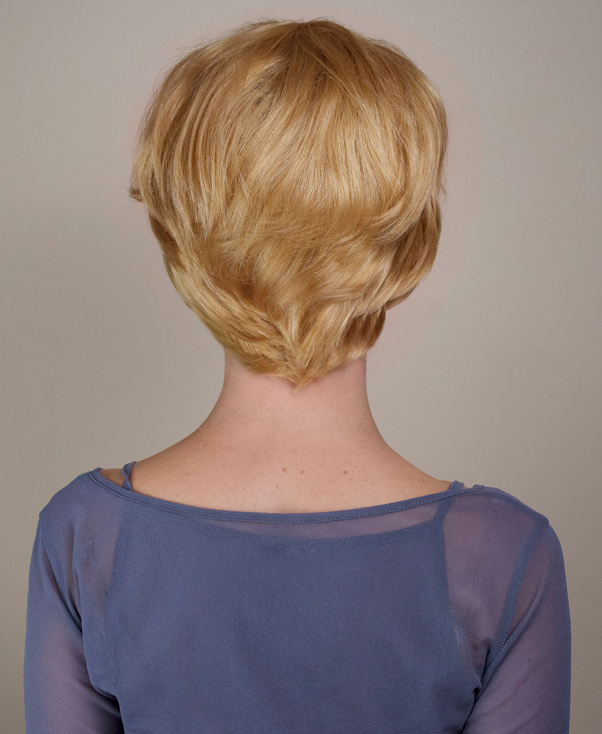 wedge cut human wig - 8" honey blonde.