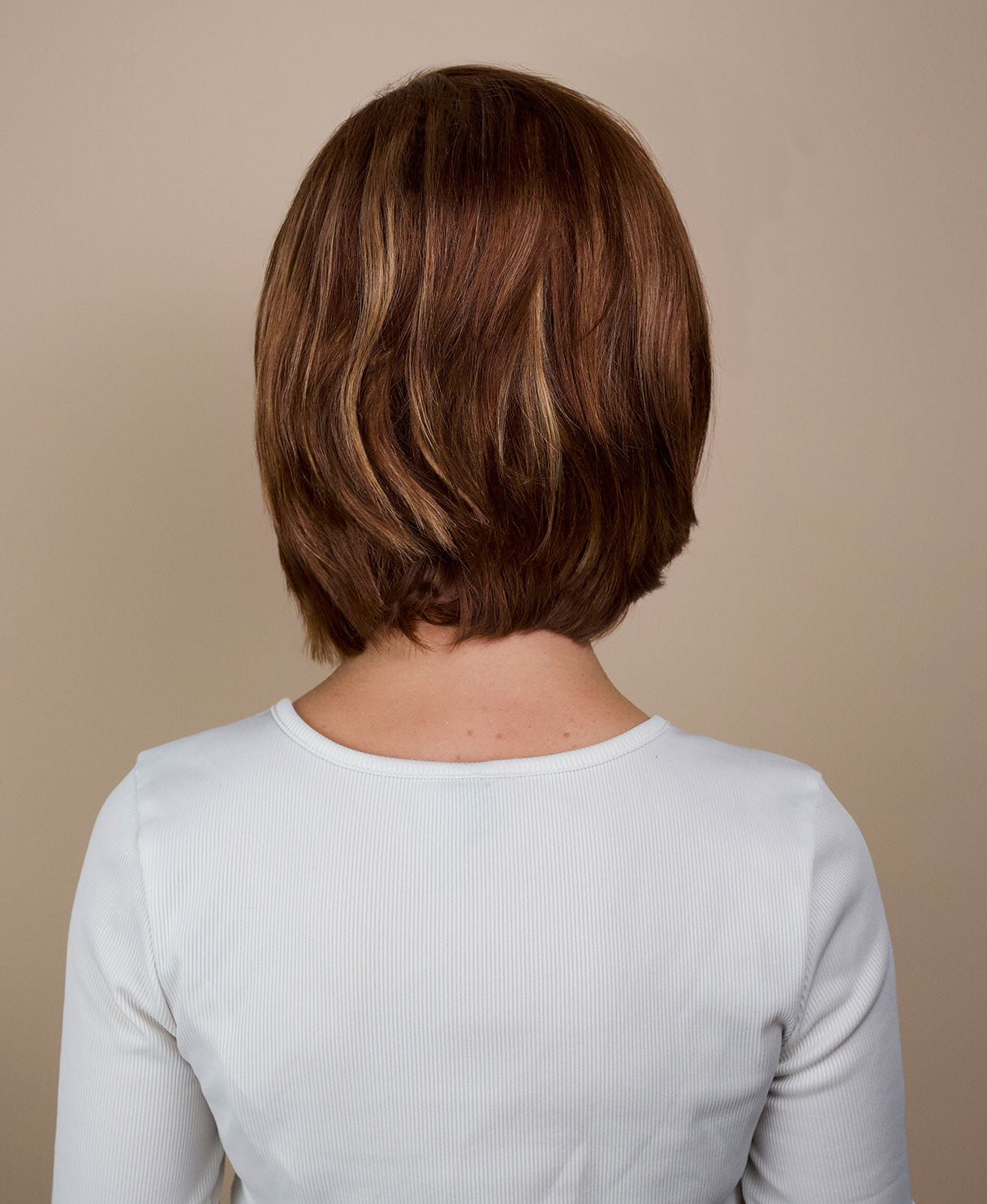 bob with side part - 10" blonde highlights.