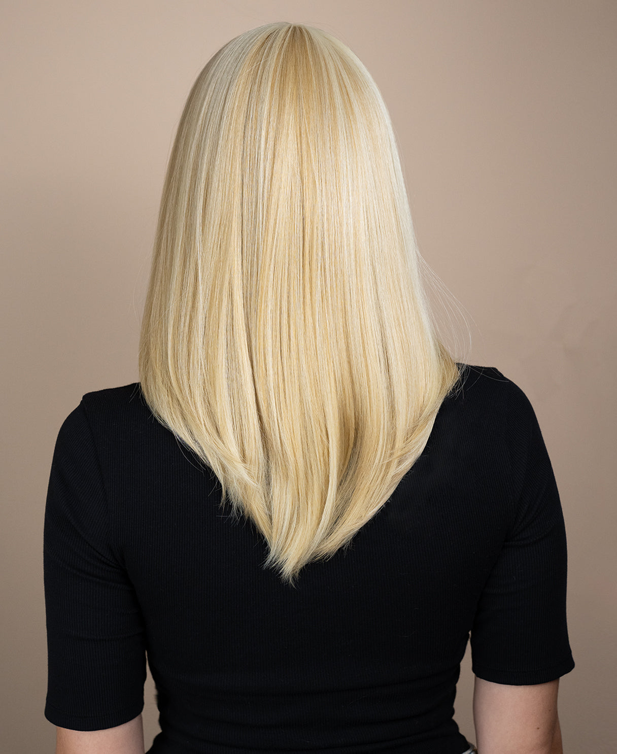 vegan fiber wig with bangs - 16" blonde highlights.