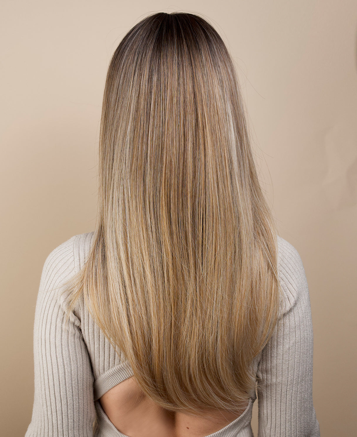 vegan fiber wig - 24" rooted medium blonde with layers.