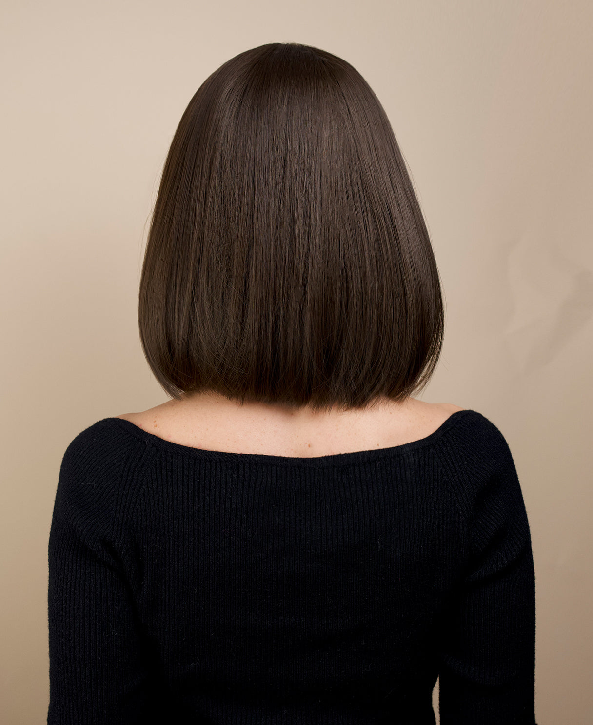 vegan fiber wig - 10" brown bob with fringe and peekaboo highlights.