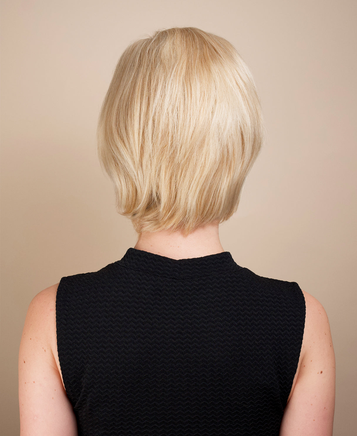 european virgin hair wig - 6" blonde highlights.