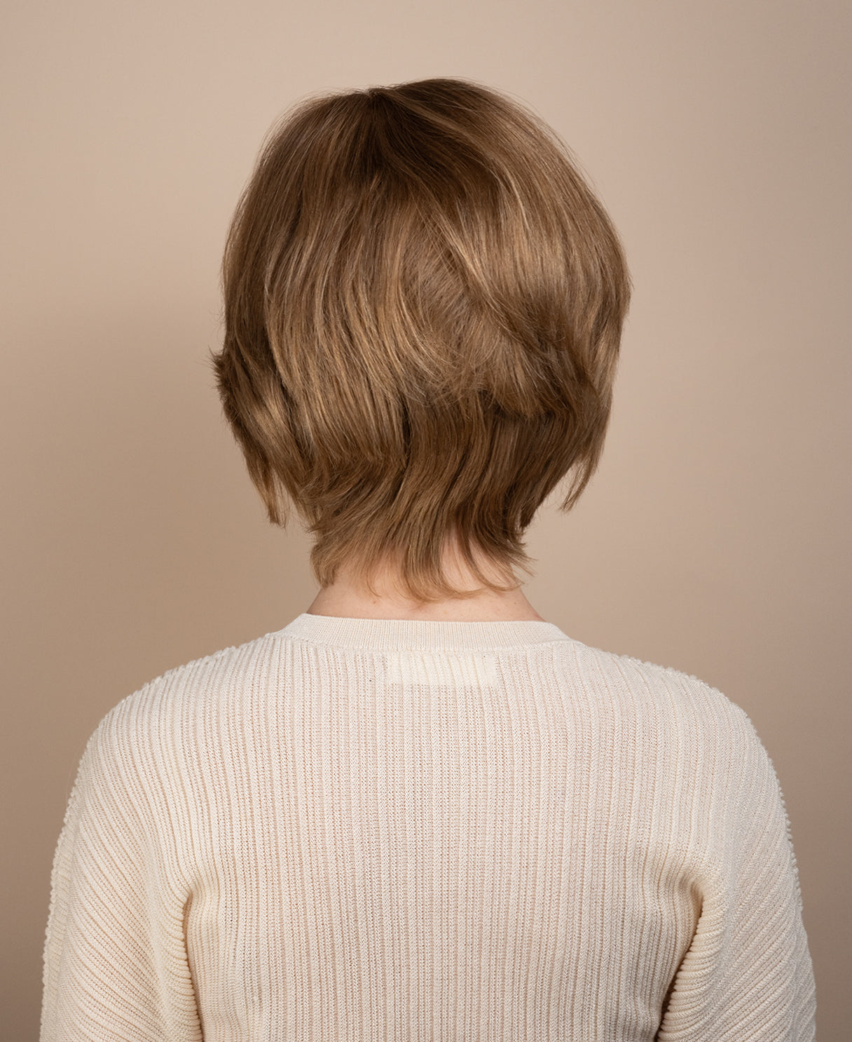 european virgin hair wig - 6" medium blonde.