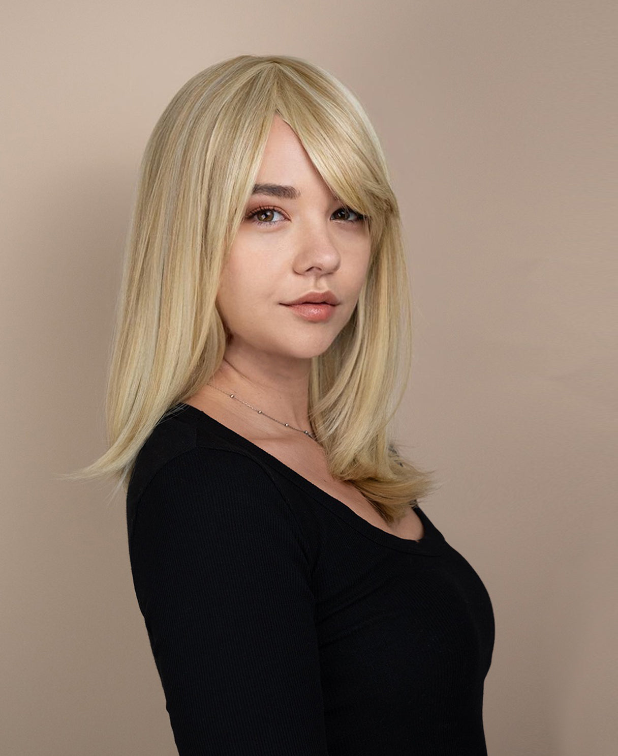 vegan fiber wig with bangs - 16" blonde highlights.