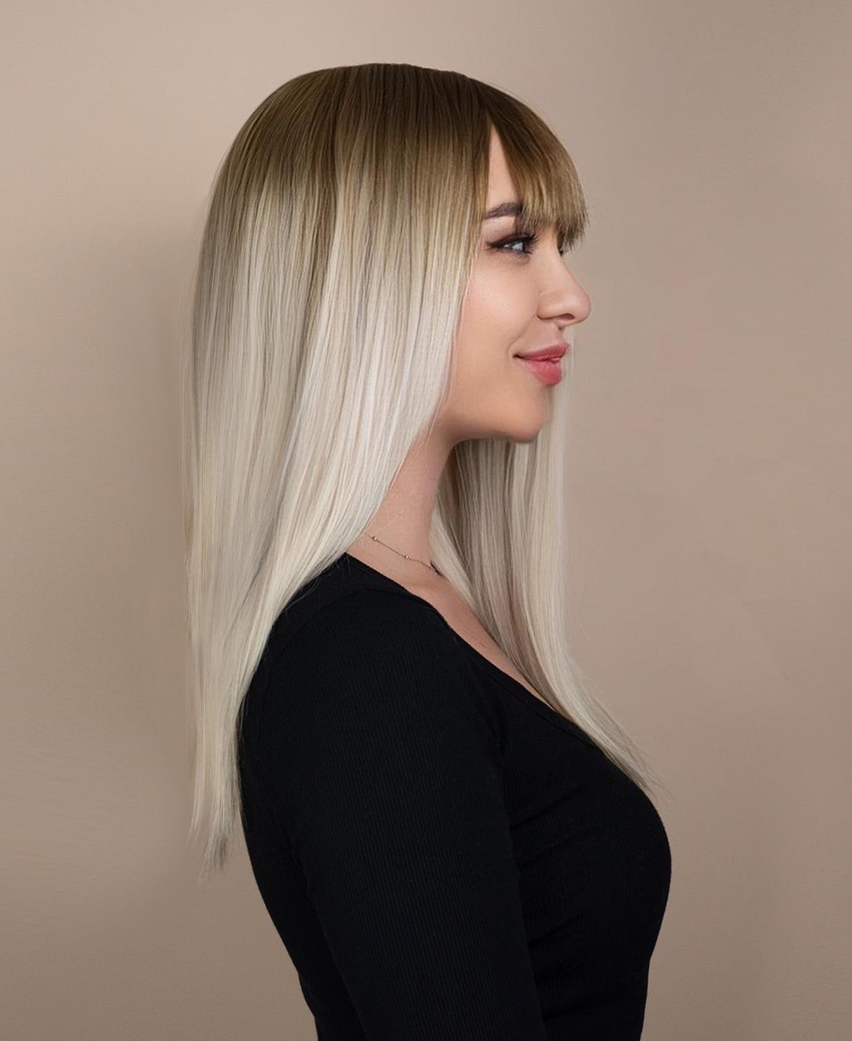 vegan fiber fringe wig - 18" rooted platinum blonde.