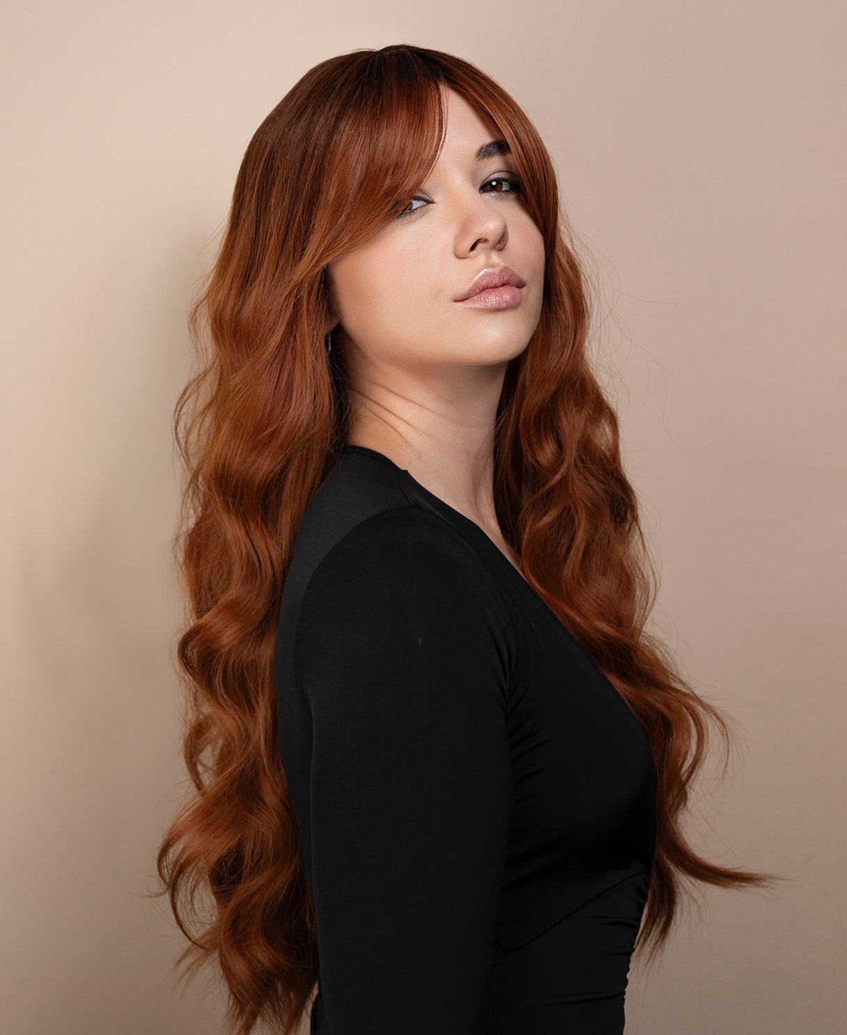 vegan fiber wig - 24" rooted pumpkin spice with curtain bangs.