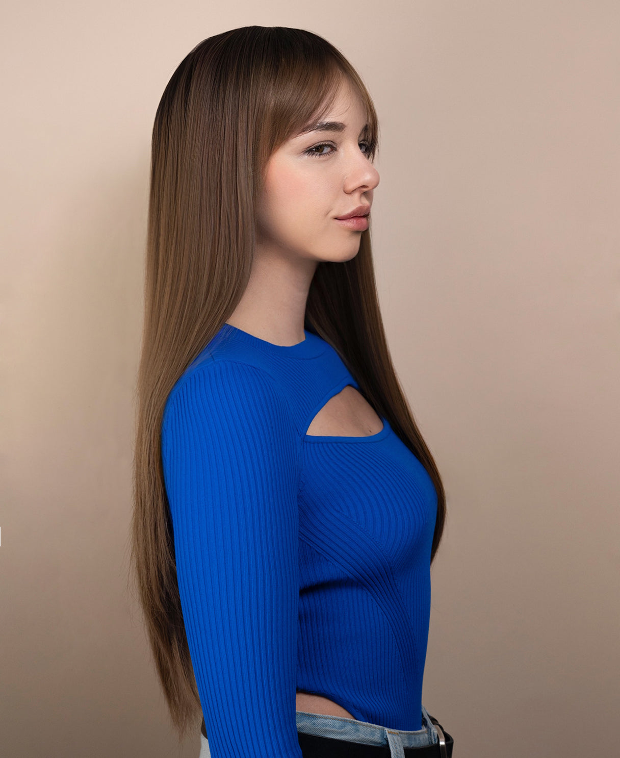 vegan fiber wig - 26" rooted ash brown with wispy bangs.