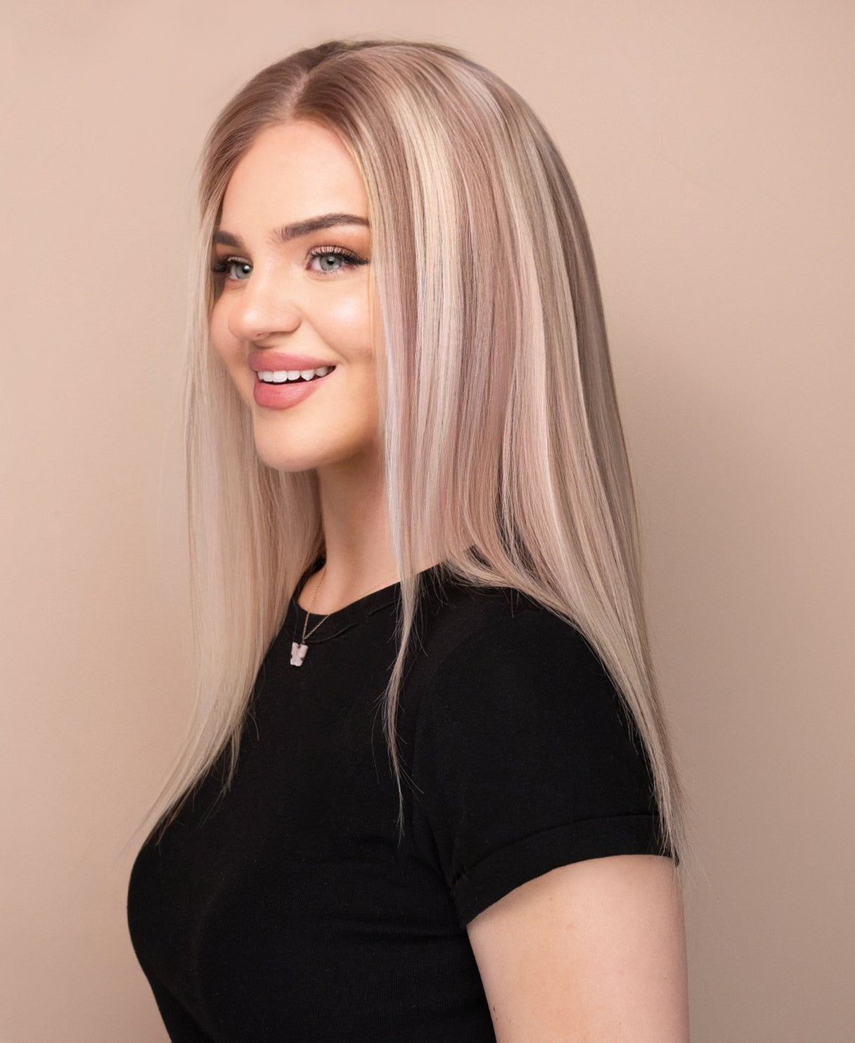 lace front human wig - 14" rooted blonde with highlights.