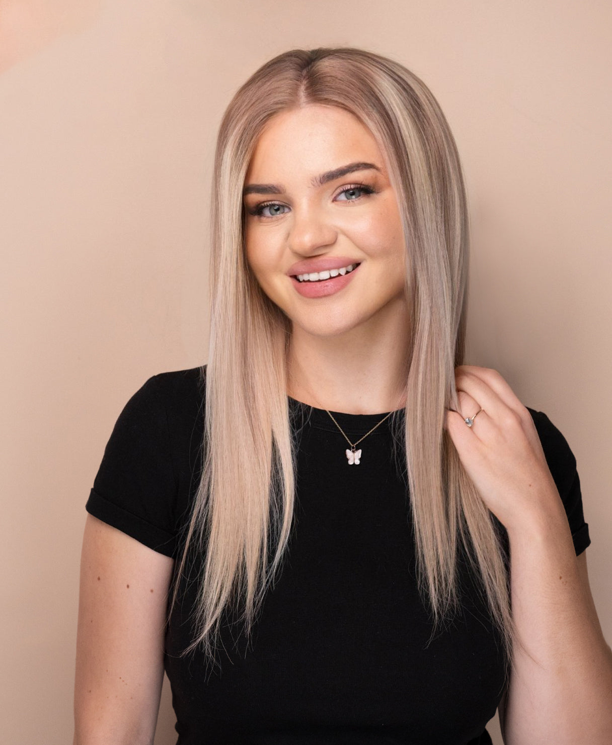 lace front human wig - 14" rooted blonde with highlights.