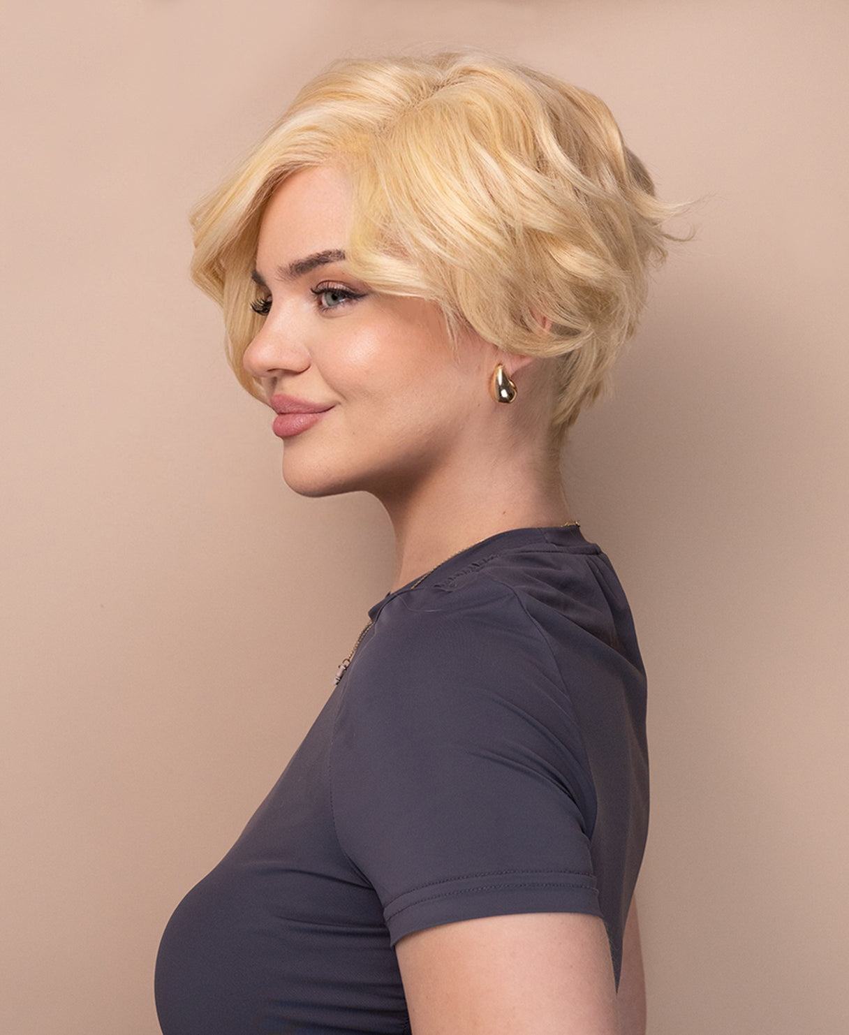 asymmetric wedge human wig - 6" light blonde.
