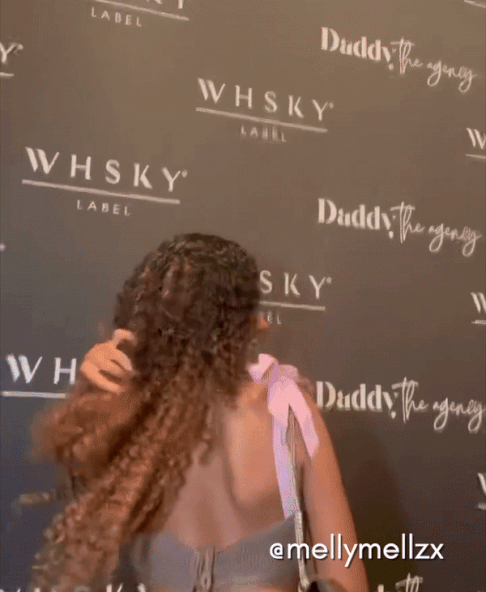 curly (3A curls) clip-in extensions light brown.