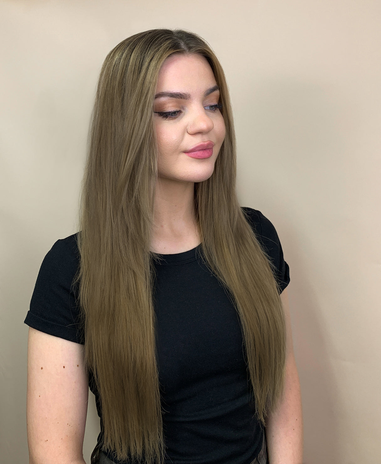 tape-in hair extensions dark blonde.