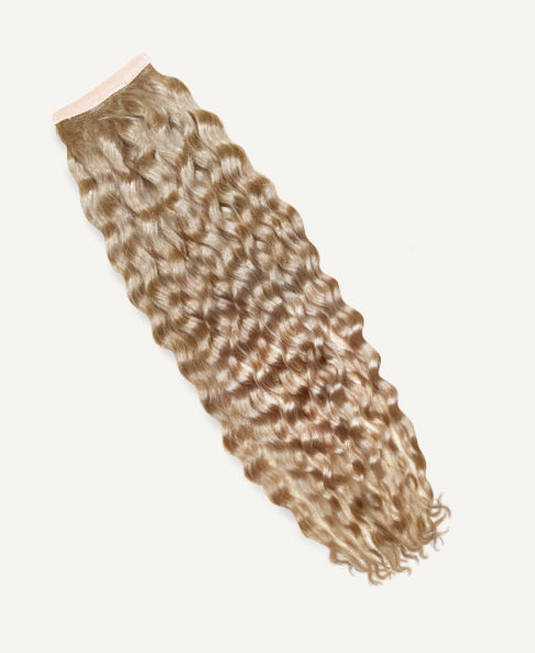 curly ponytail - honey blonde.