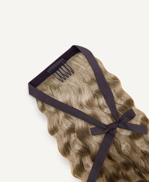 curly ponytail - ash blonde.