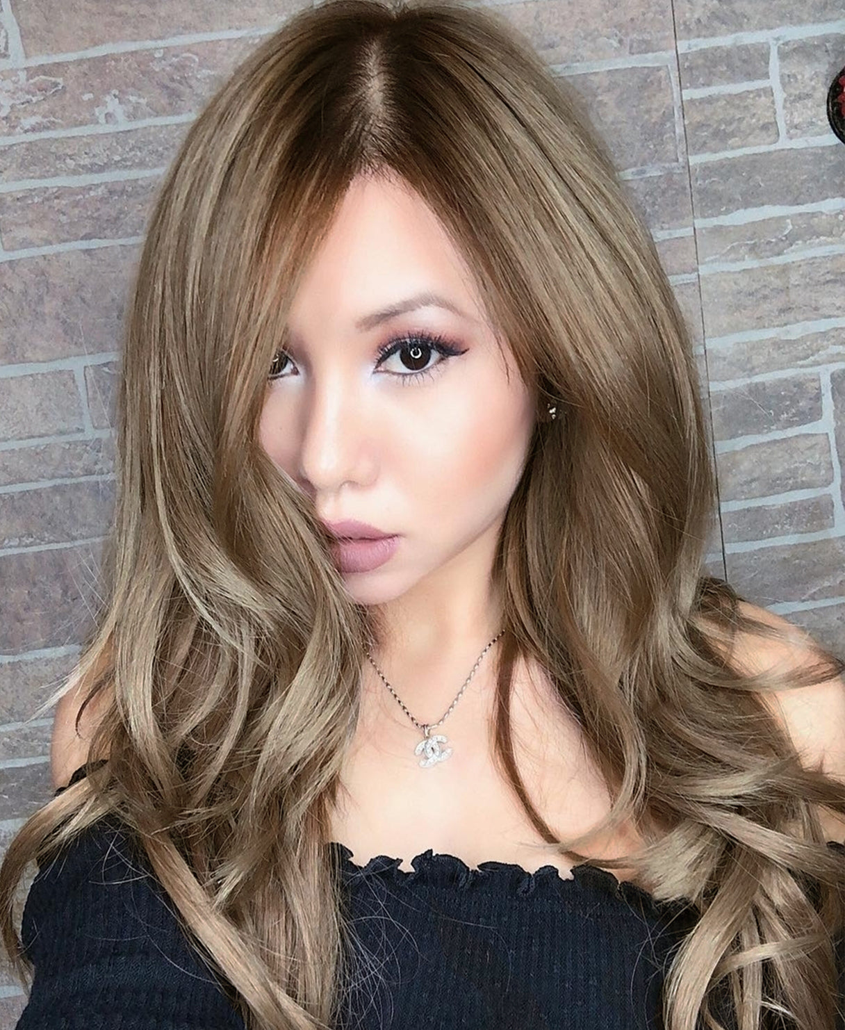 invisible clip-in hair extensions ash blonde.