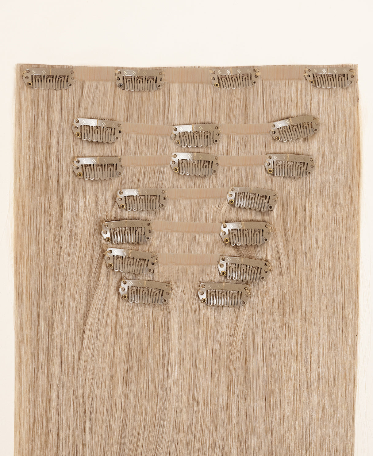 invisible clip-in hair extensions champagne blonde.