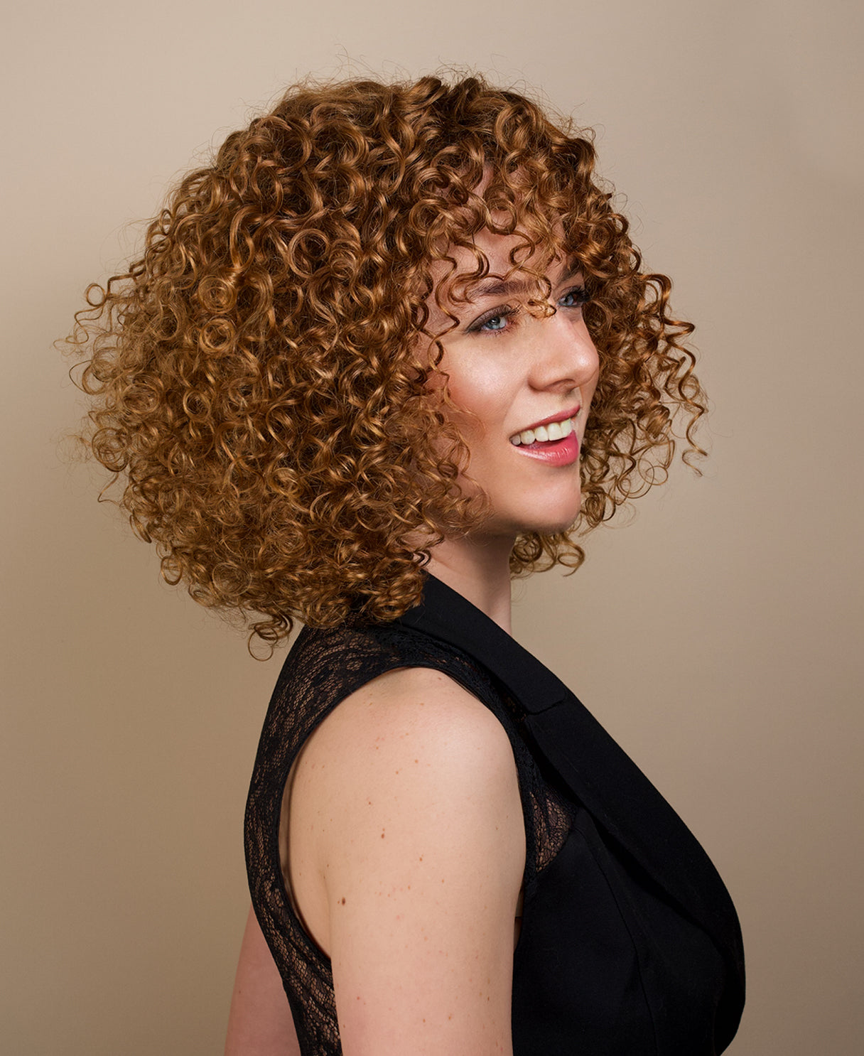 put on & go curly human wig - 14" strawberry blonde with bangs.