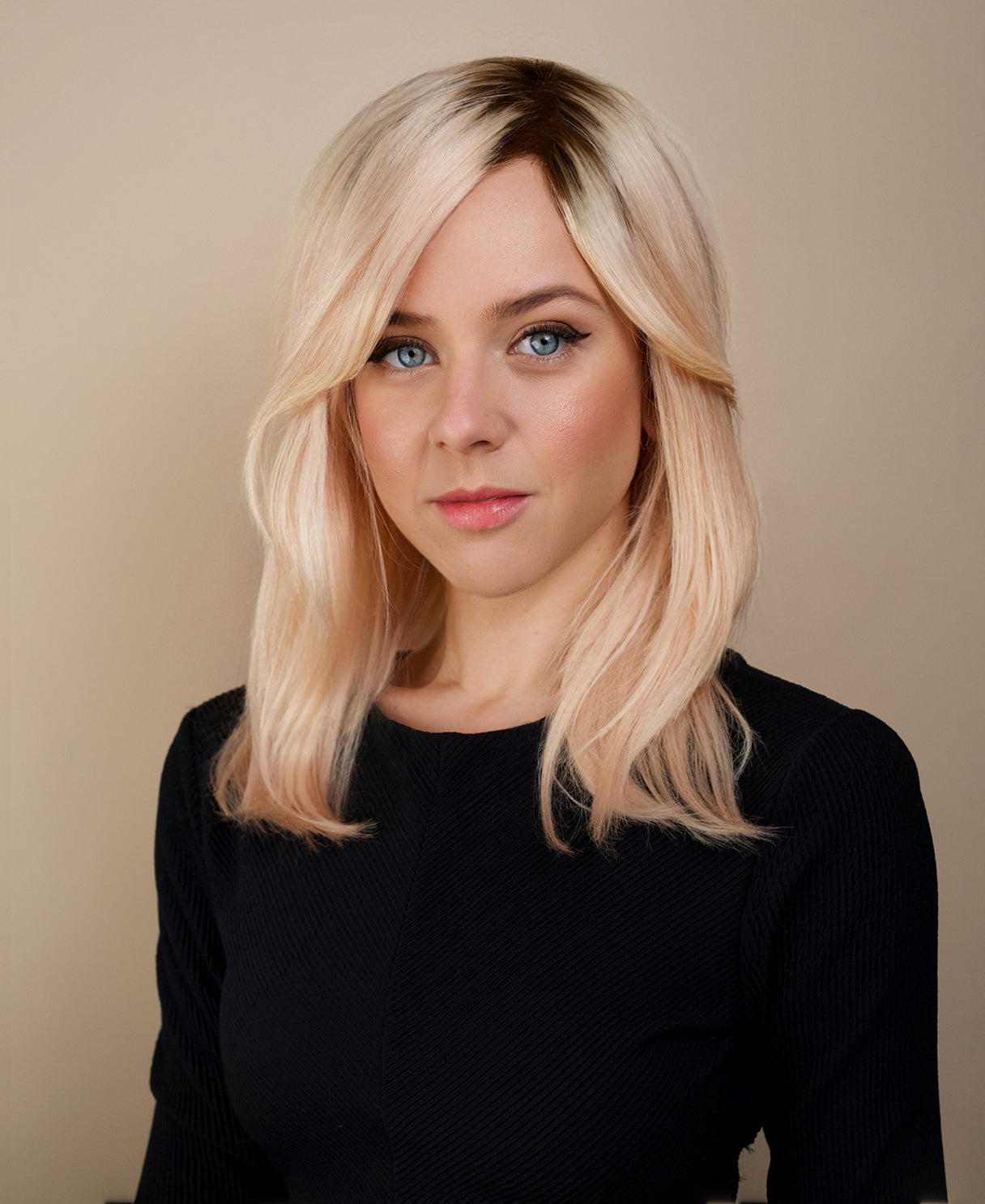 human hair wig with side bangs - 16" rooted blonde.