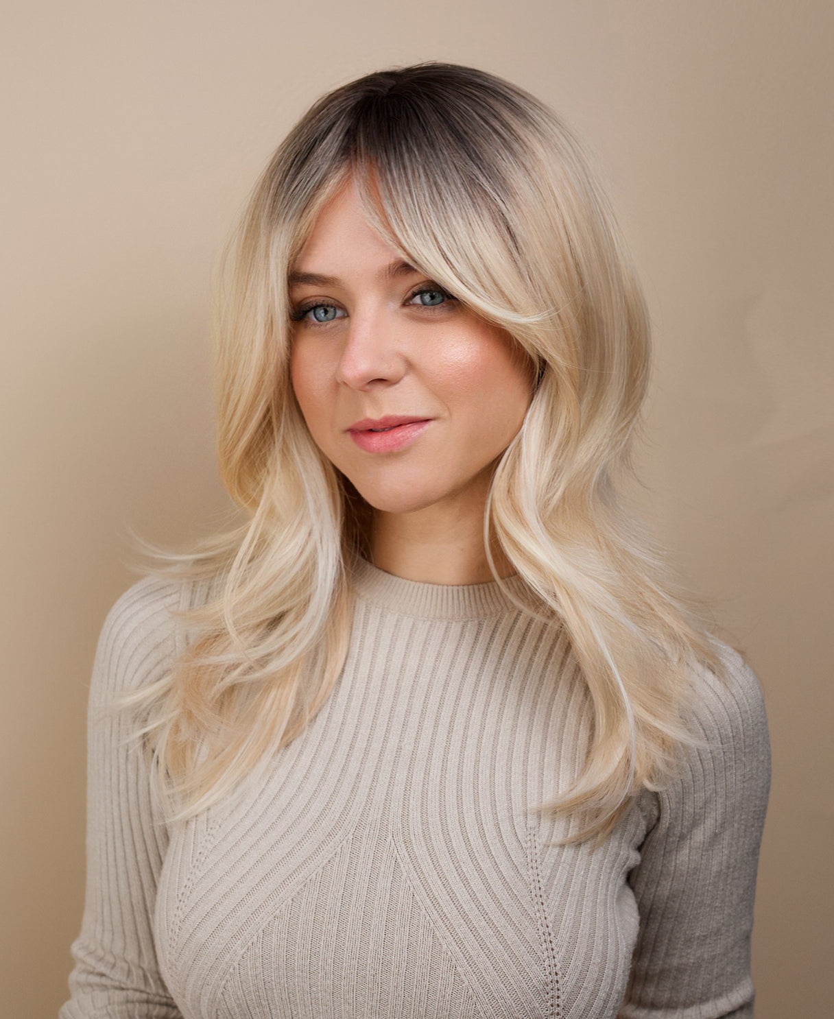 vegan fiber wig - 20" layered rooted blonde.