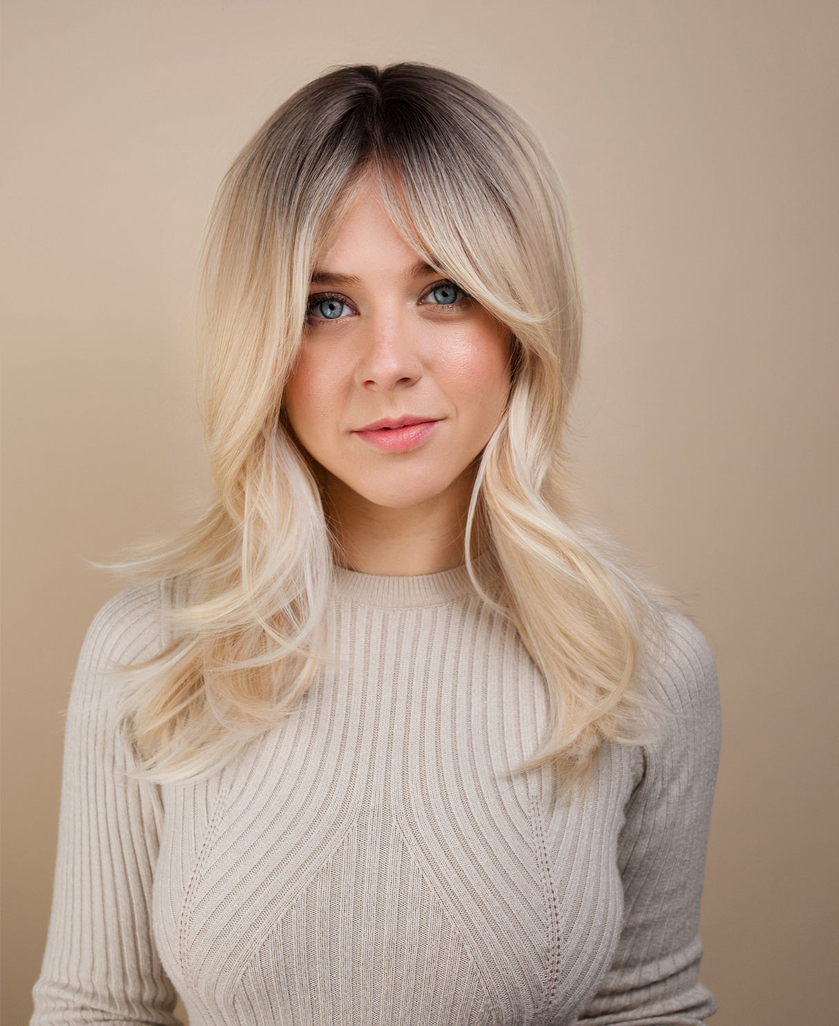 vegan fiber wig - 20" layered rooted blonde.