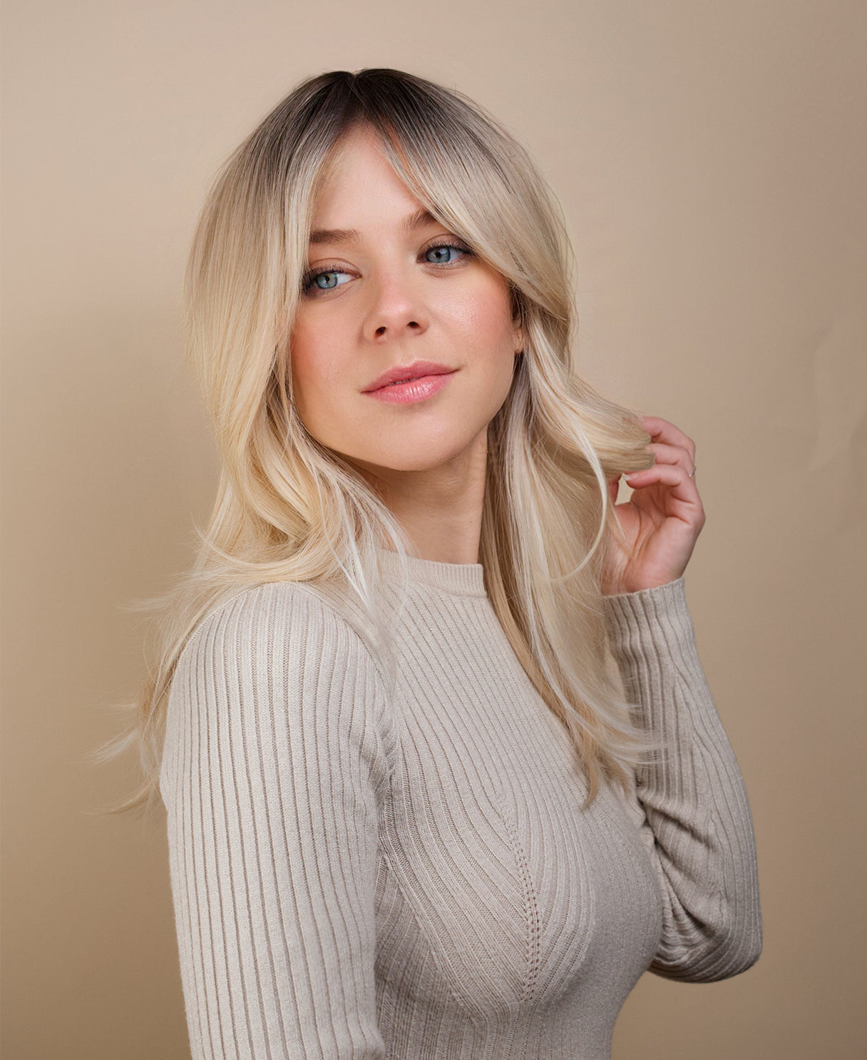 vegan fiber wig - 20" layered rooted blonde.