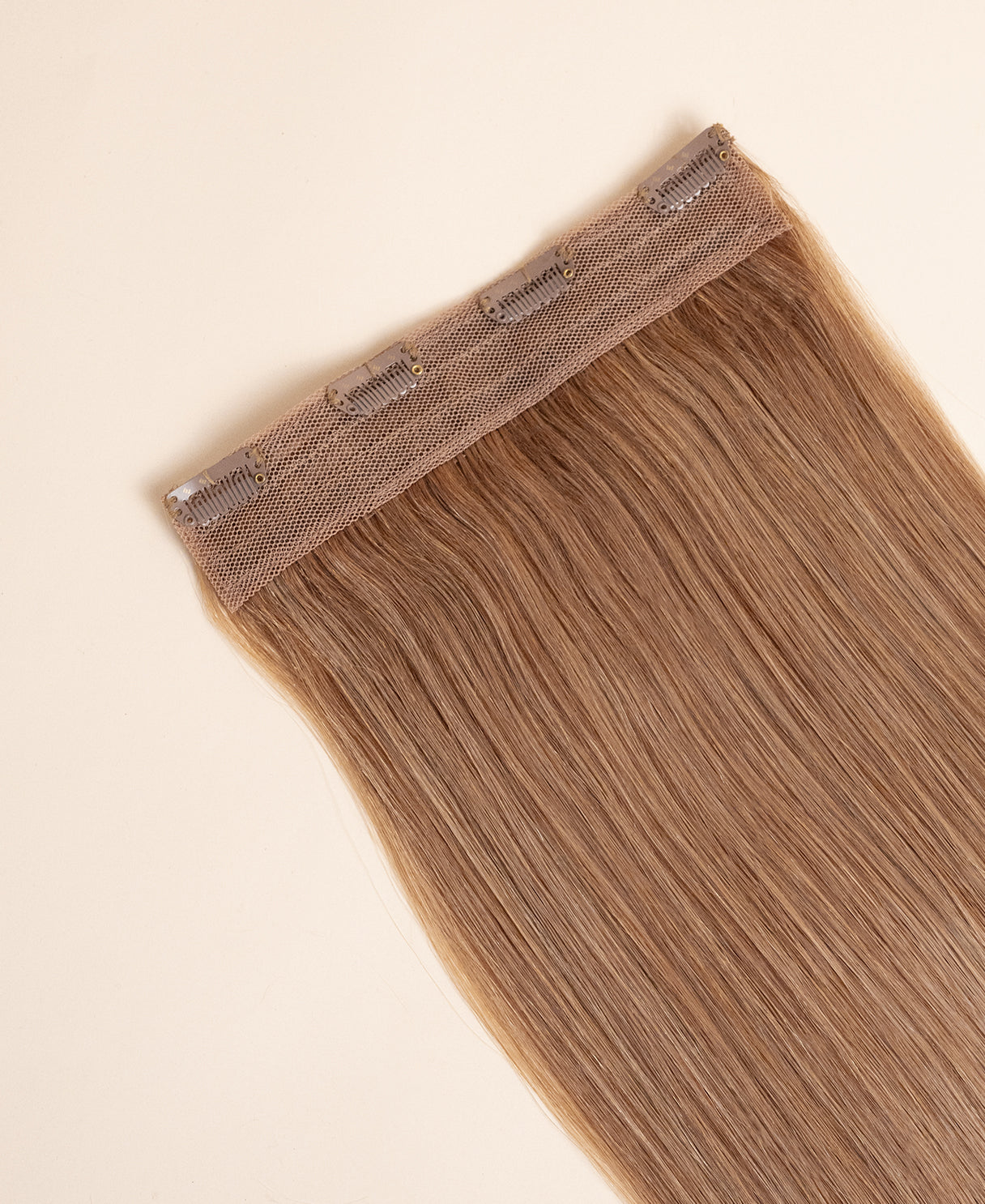 clip-in volumizer strawberry blonde.