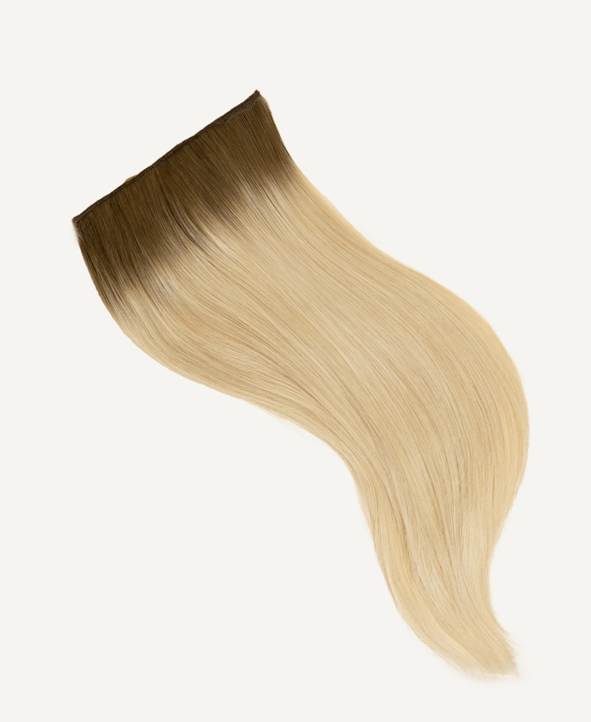 clip-in volumizer rooted blonde.
