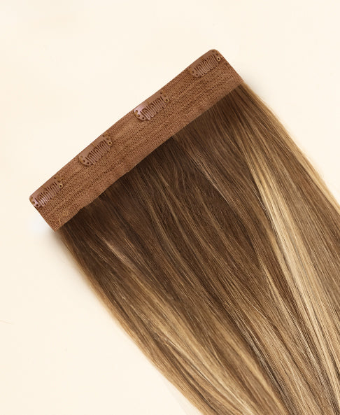 clip-in volumizer teddy blonde balayage.