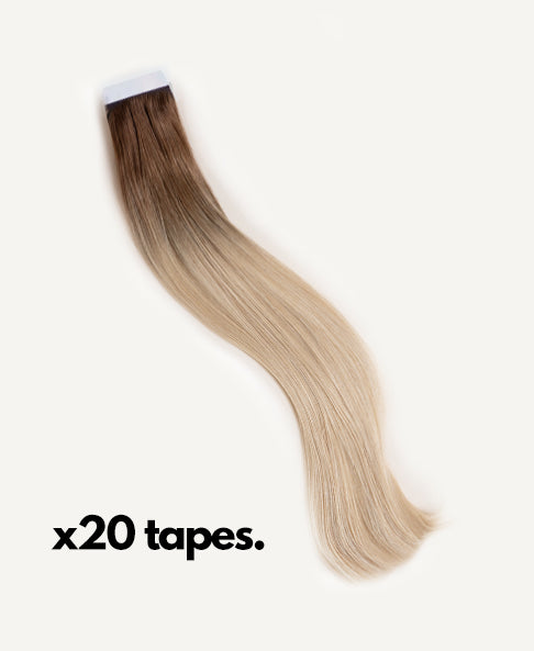 tape-in hair extensions shadow root white blonde.