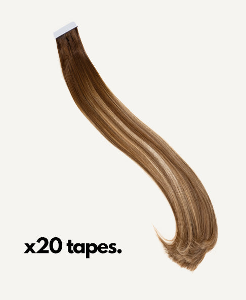 tape-in hair extensions rooted beige highlights.