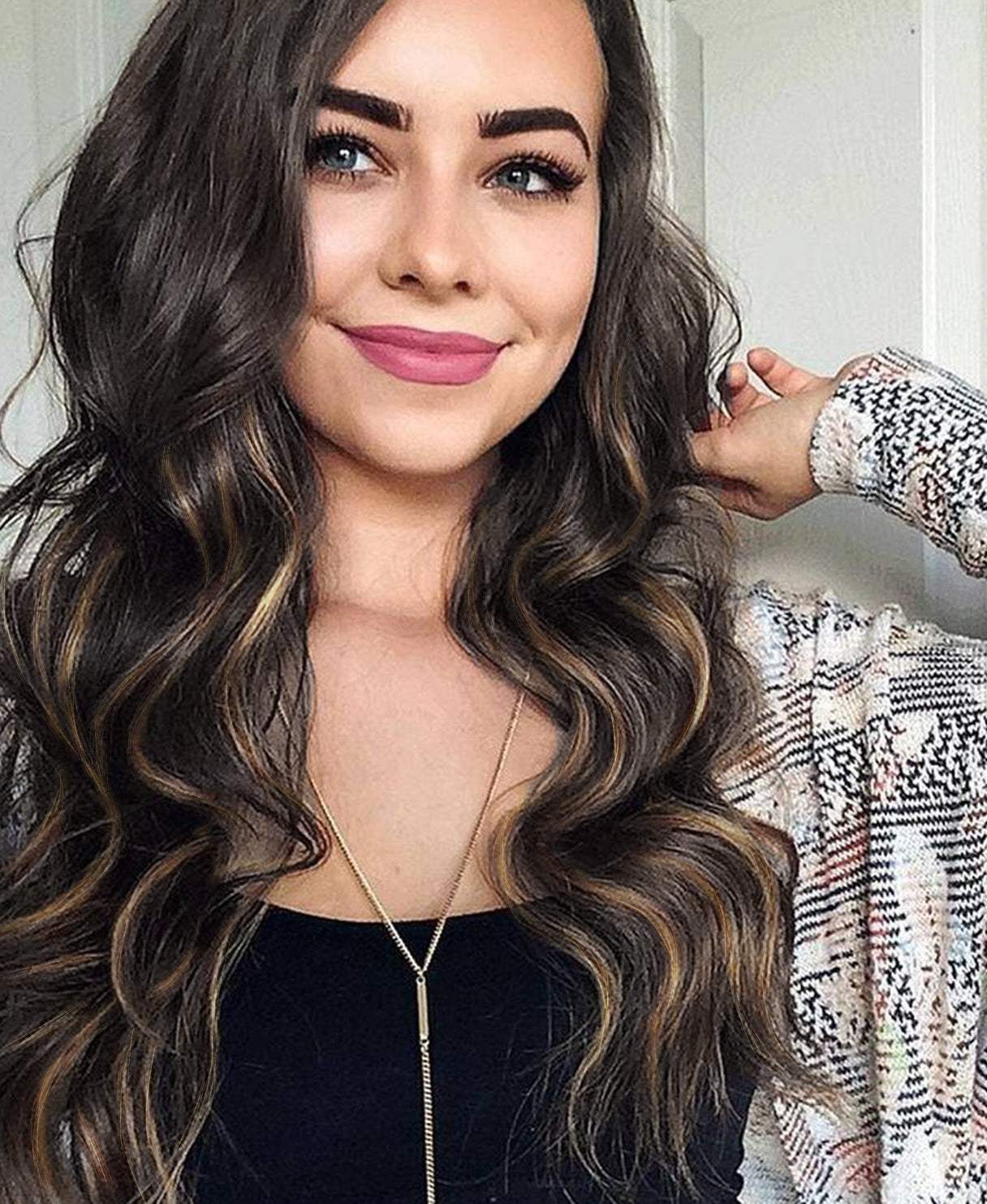 tape-in hair extensions dark highlights.